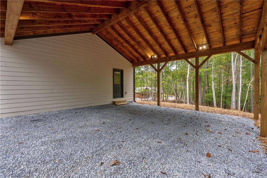 Exterior details and patio area of a home in , Ellijay (Image 25).