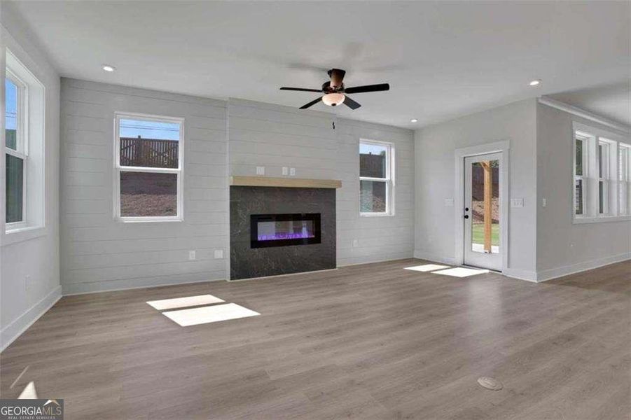Spacious, unfurnished interior of a new home in The Paddocks at Doc Hughes, Buford (Image 28).