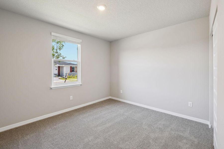 Spacious, unfurnished interior of a new home in Hampton Park - Classic Series, Vero Beach (Image 17).