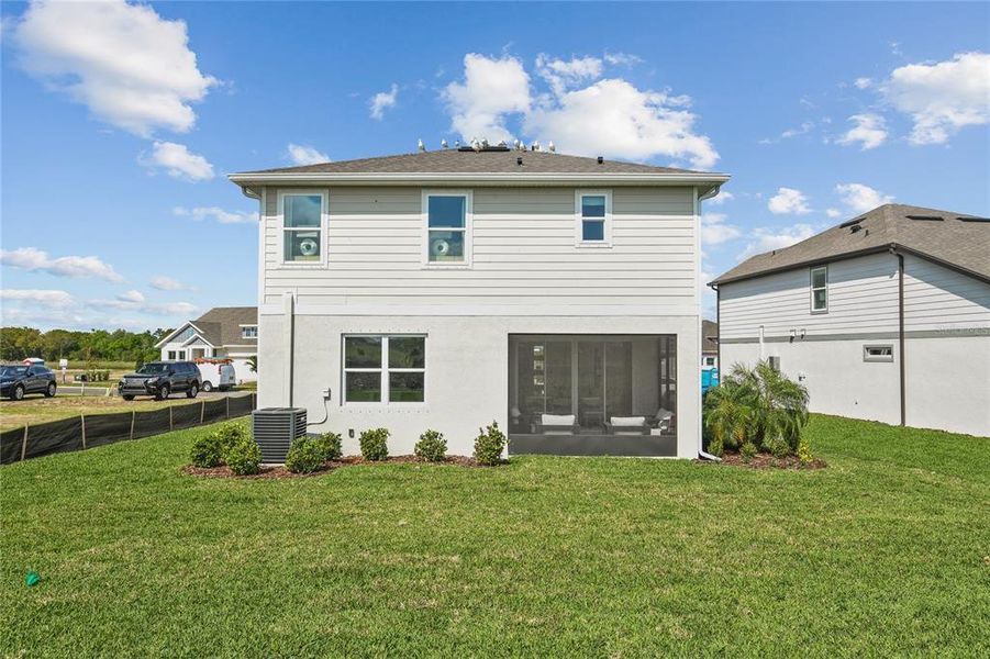 Exterior details and patio area of a home in Waterset, Apollo Beach (Image 22).