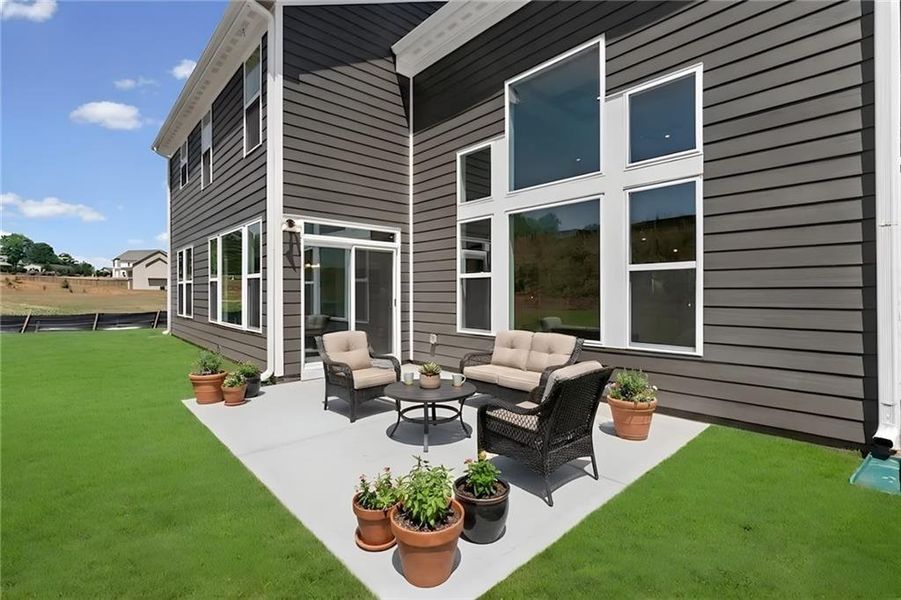 Exterior details and patio area of a home in Hidden Fields, Hoschton (Image 4). Exterior details and patio area of a home in Hidden Fields, Hoschton (Image 4).
