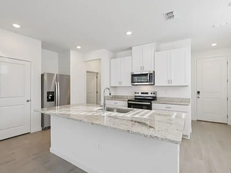 Furnished interior view inside a new home in Cypress Meadows - The Villas, Jacksonville (Image 3).