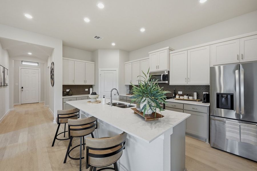 Representative furnished interior of a home built from the The Albany by Lillian Custom Homes in Tabor Ranch, Ponder (Image 12).