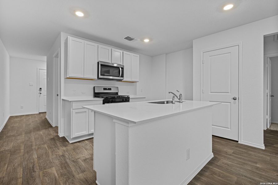 Furnished interior view inside a new home in Avenida, Converse (Image 4).