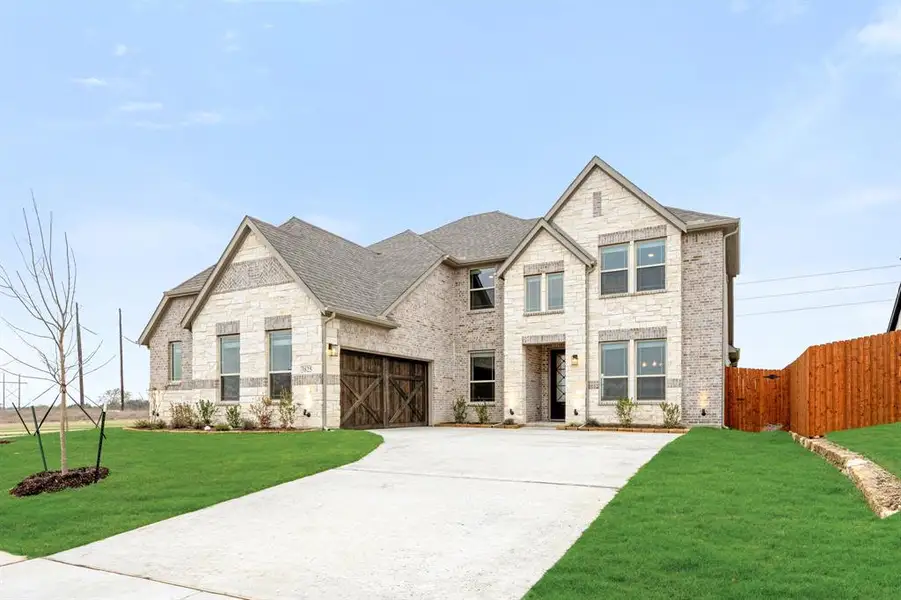 Front exterior of a new home in Villages of Walnut Grove, Midlothian, TX, highlighting curb appeal (Image 23).