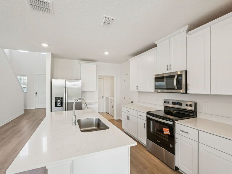 Furnished interior view inside a new home in Crosswinds - Classic Series, Haines City (Image 4).