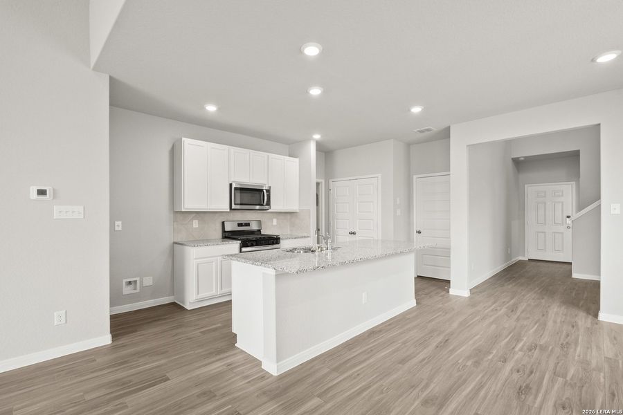 Furnished interior view inside a new home in Hickory Ridge, Elmendorf (Image 9).
