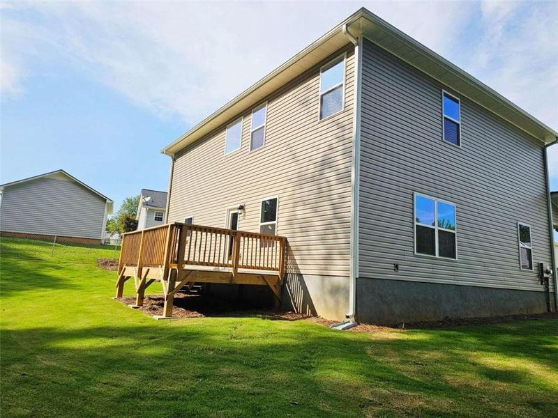 Exterior details and patio area of a home in Scarlett Place, Bowdon (Image 2).