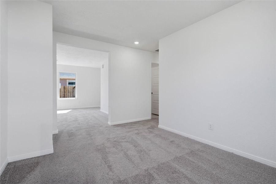 Additional view from Den looking to hallway leading to the secondary bedrooms and bathroom.