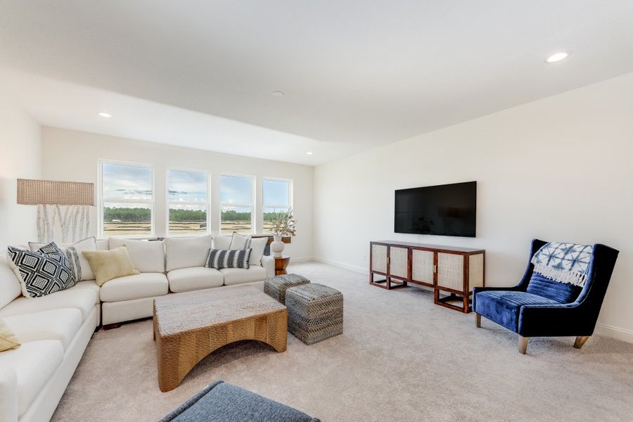 Representative furnished interior of a home built from the Ortega by Riverside Homes in Hidden Creek at SilverLeaf 80' Series, St. Augustine (Image 47).