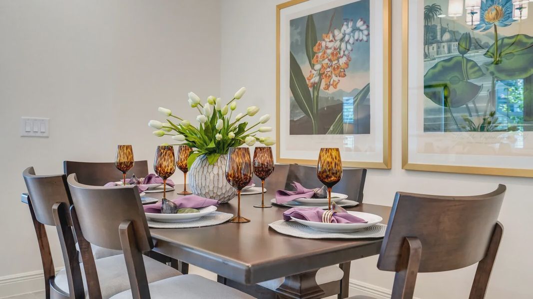 Representative furnished interior of a home built from the Dream 2 by Neal Communities in SkySail, Naples (Image 18).