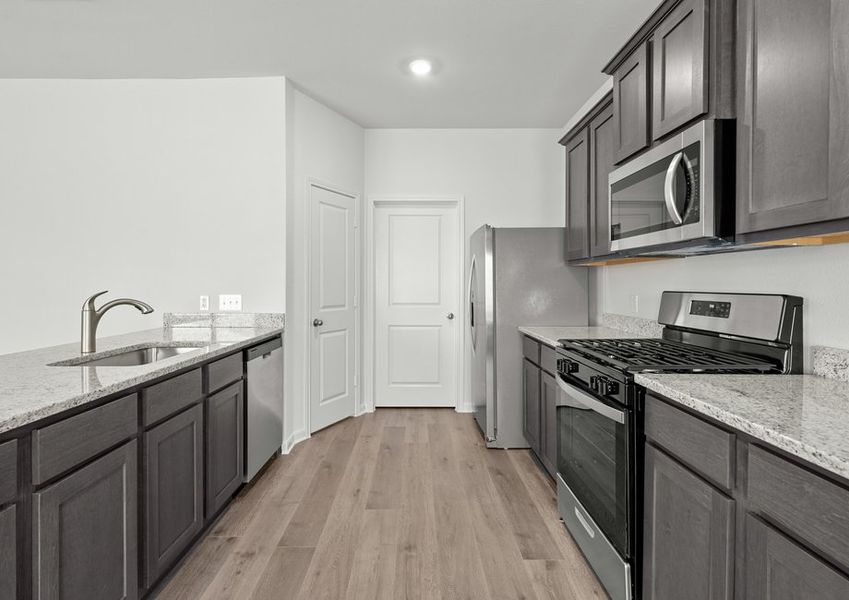 The kitchen of the Cypress has energy-efficient appliances. The kitchen of the Cypress has energy-efficient appliances.