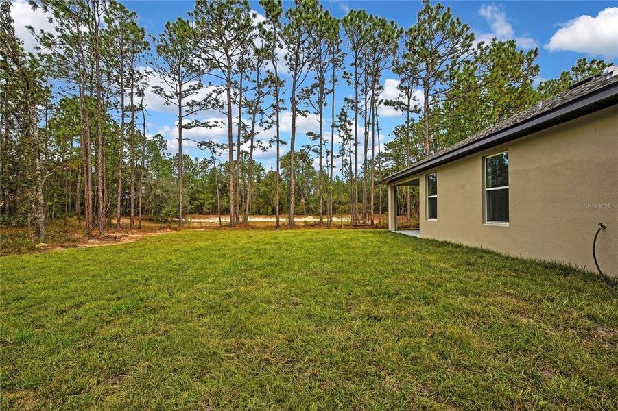 Exterior details and patio area of a home in , Weeki Wachee (Image 35).