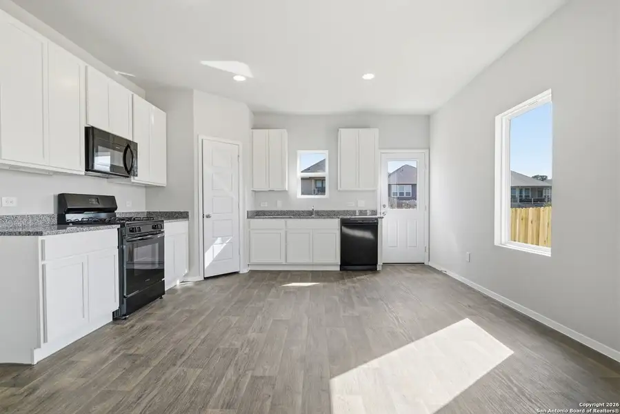 Furnished interior view inside a new home in Hunters Ranch, San Antonio (Image 5).