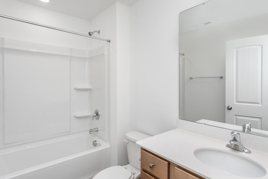 Furnished interior view inside a new home in Running Brook Townes, Durham (Image 8).