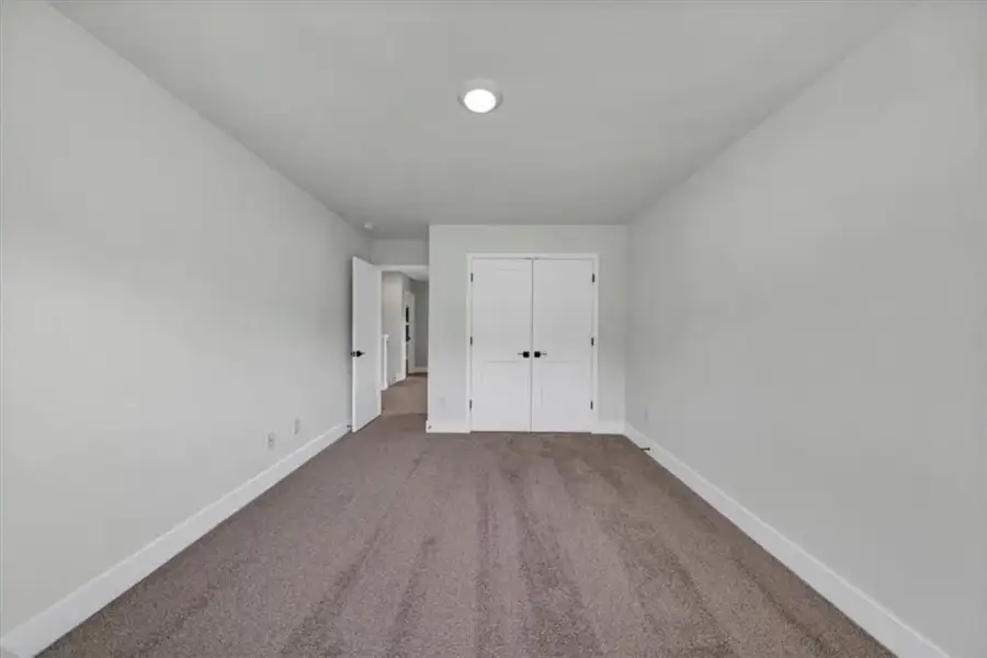 Spacious, unfurnished interior of a new home in Canterbury Villas, Carrollton (Image 23).