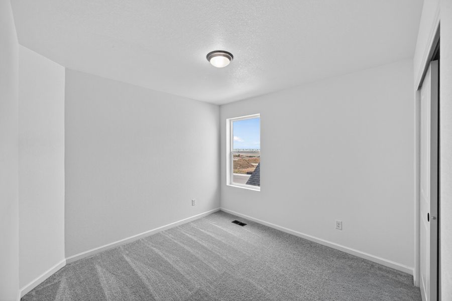 Spacious, unfurnished interior of a new home in Sky Ranch, Watkins (Image 29). Spacious, unfurnished interior of a new home in Sky Ranch, Watkins (Image 29).