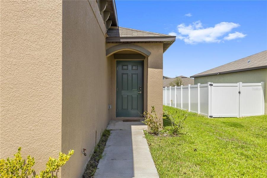 Exterior details and patio area of a home in Wind Meadows South, Bartow (Image 33).