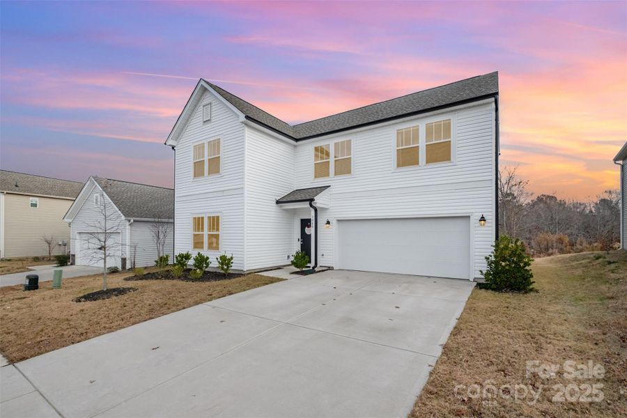 Front exterior of a new home in , Mount Holly, NC, highlighting curb appeal (Image 25).