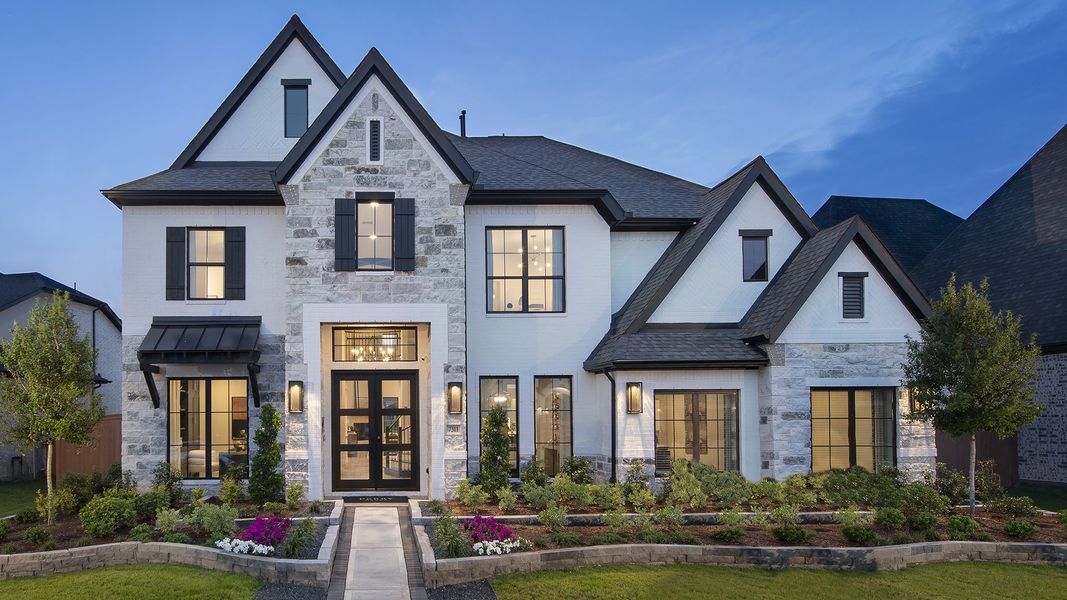 Representative exterior photo of a completed home built from the 4098W by Perry Homes in Valencia, Manvel, TX (Image 22).