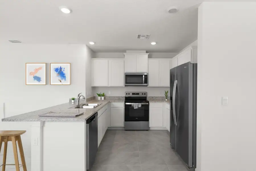 Exterior details and patio area of a home in Central Park 40s, Port St. Lucie (Image 3).