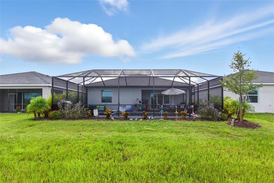 Front exterior of a new home in , Venice, FL, highlighting curb appeal (Image 19).