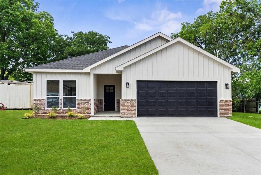 Front exterior of a new home in , Greenville, TX, highlighting curb appeal (Image 27).