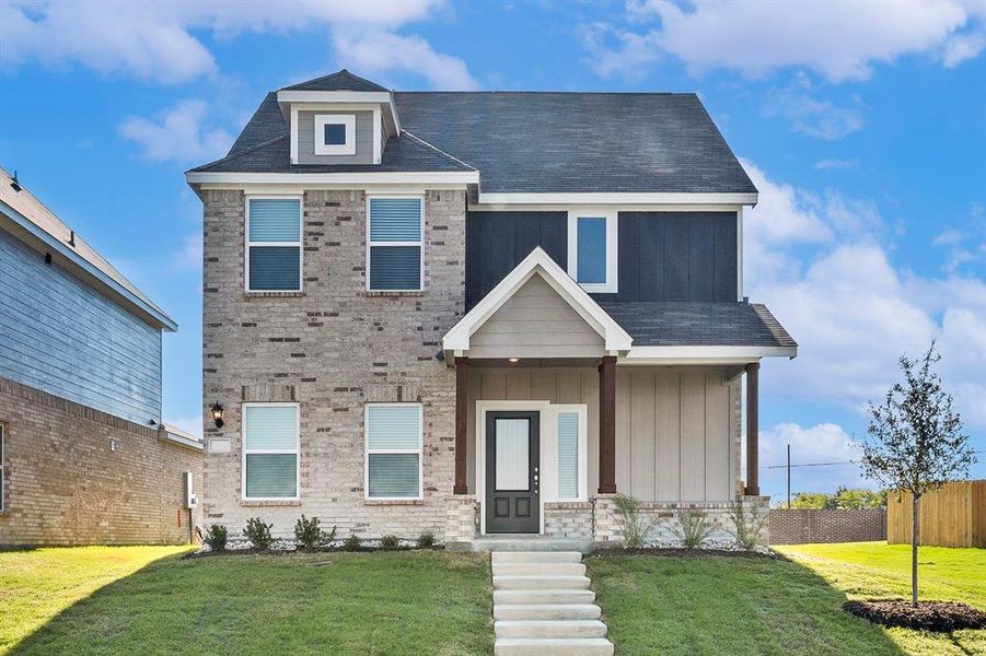 Front exterior of a new home in Southaven, Hutchins, TX, highlighting curb appeal (Image 1).