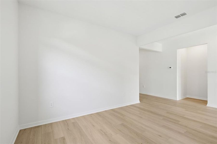 Spacious, unfurnished interior of a new home in Coasterra - Reserve Series, Palmetto (Image 32).