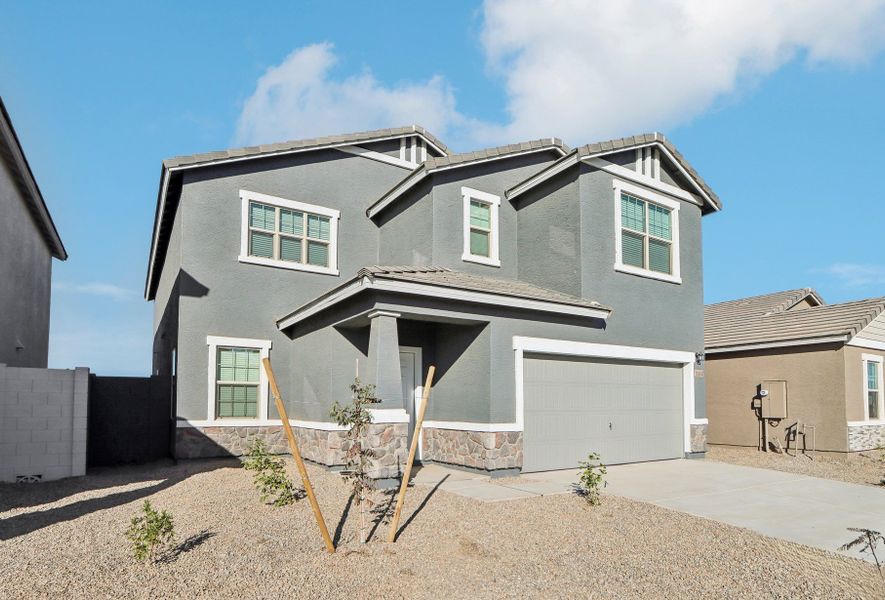 Representative exterior photo of a completed home built from the Eclipse by Starlight Homes in Villages at Accomazzo, Tolleson, AZ (Image 26).