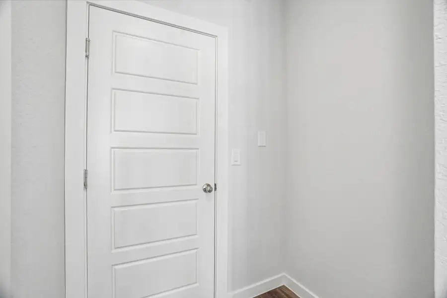 Spacious, unfurnished interior of a new home in The Meadows at Hunters Ranch, San Antonio (Image 40).