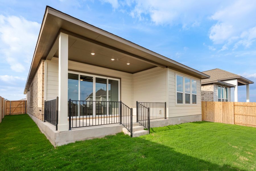 Exterior details and patio area of a home in Lariat, Liberty Hill (Image 25).