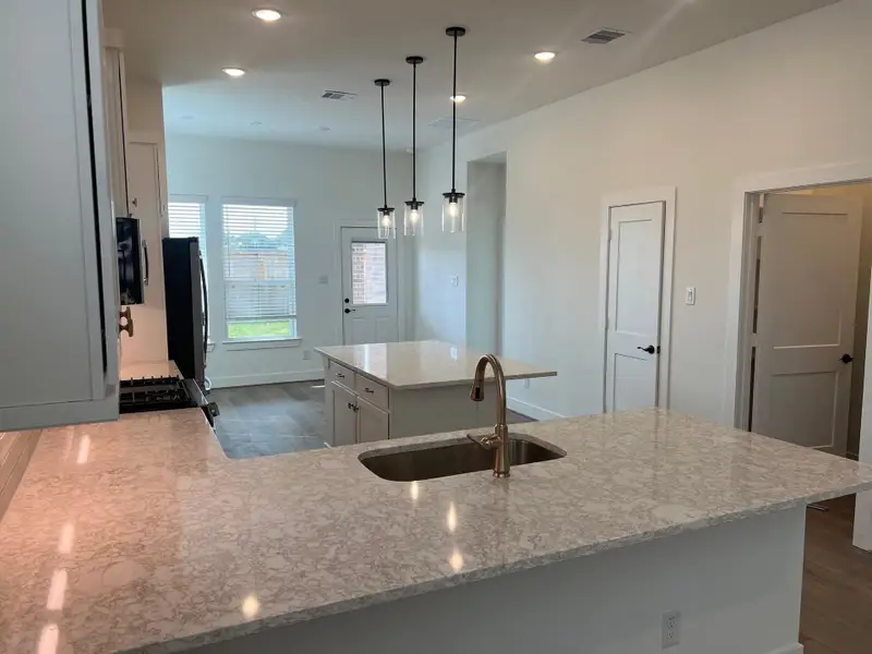Furnished interior view inside a new home in Wood Leaf Reserve, Tomball (Image 4).