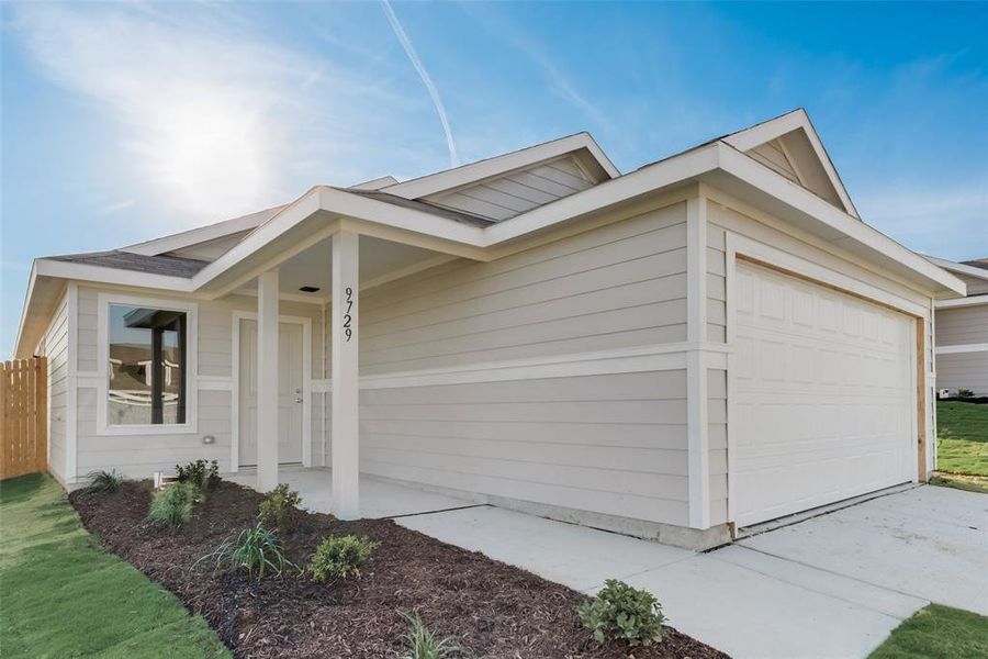 Ranch-style house featuring a garage