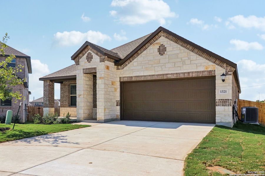 Front exterior of a new home in , San Antonio, TX, highlighting curb appeal (Image 22). Front exterior of a new home in , San Antonio, TX, highlighting curb appeal (Image 22).