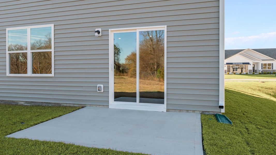 Exterior details and patio area of a home in Villa Grande, Winterville (Image 22).