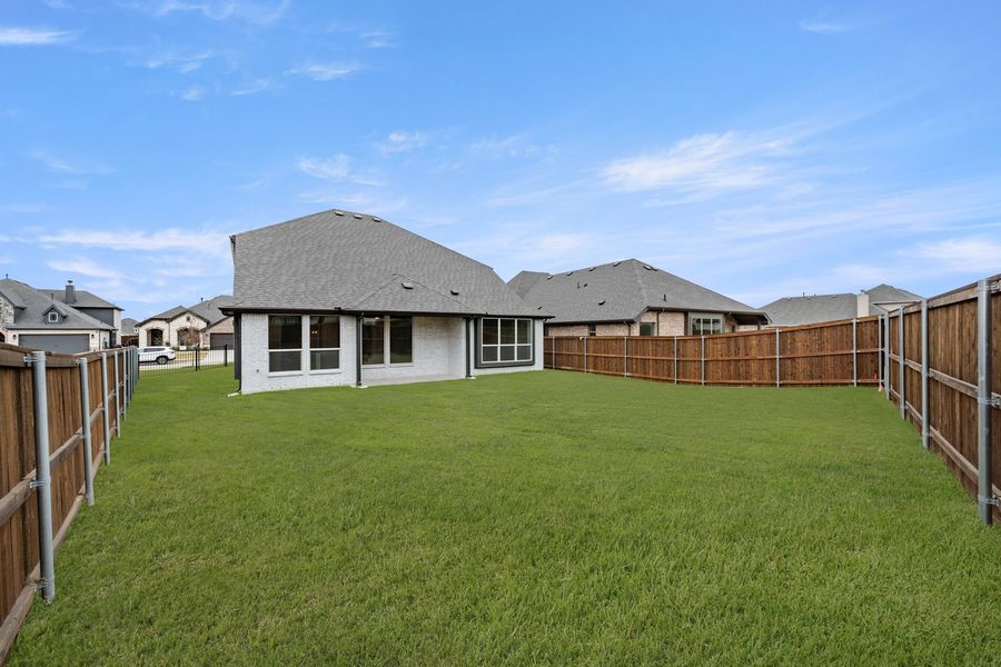Exterior details and patio area of a home in Silo Mills - Select Series, Joshua (Image 3).