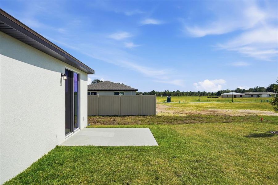 Exterior details and patio area of a home in Leyland Preserve - Premier Series, Brooksville (Image 4).