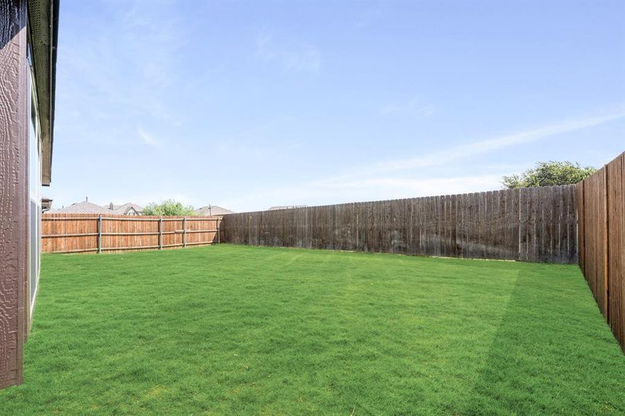 Exterior details and patio area of a home in Godley Ranch Classic, Godley (Image 4). Exterior details and patio area of a home in Godley Ranch Classic, Godley (Image 4).