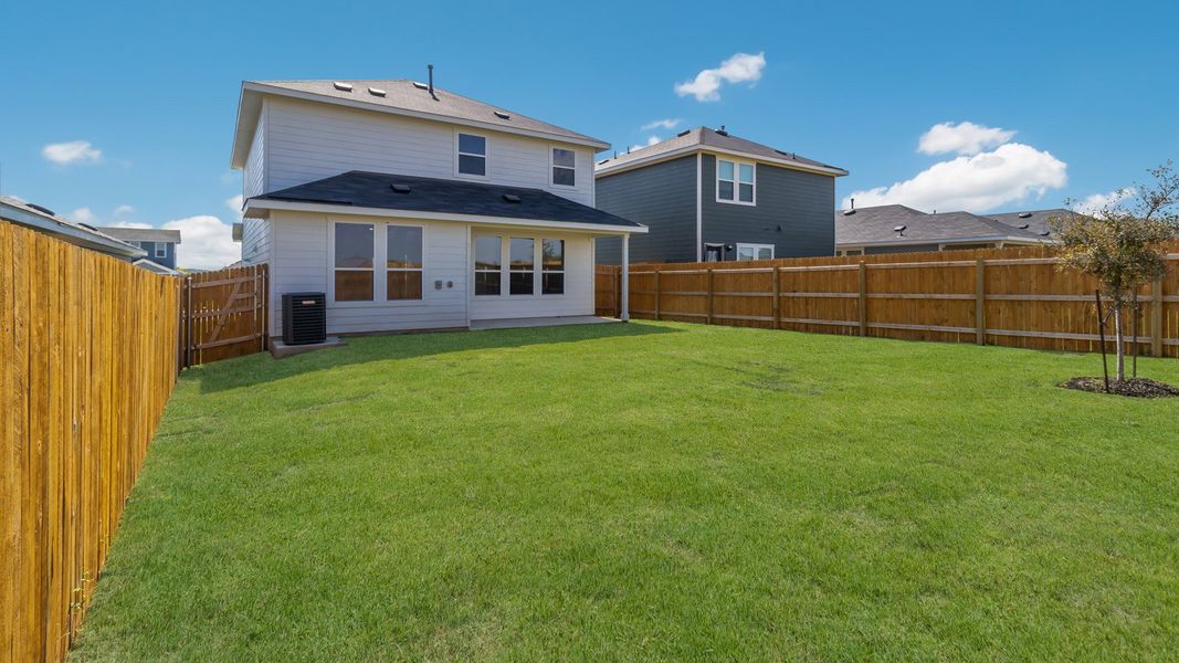 Representative exterior photo of a completed home built from the The Ivory by D.R. Horton in Marigold, Kyle, TX (Image 14). Representative exterior photo of a completed home built from the The Ivory by D.R. Horton in Marigold, Kyle, TX (Image 14).