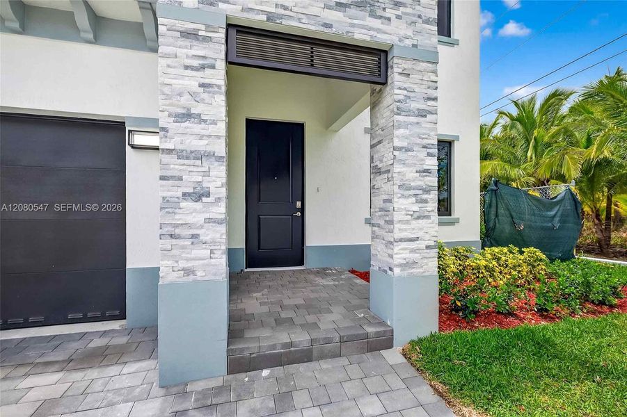 Exterior details and patio area of a home in , Homestead (Image 4).