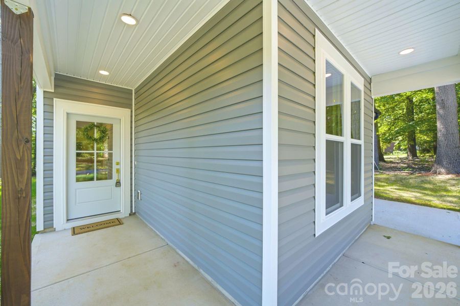 Exterior details and patio area of a home in , Charlotte (Image 3).