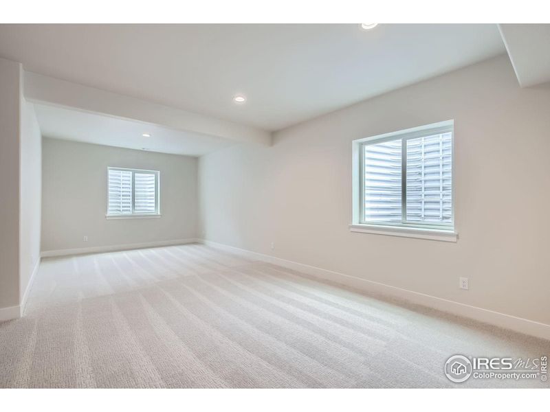 Spacious, unfurnished interior of a new home in RainDance National 60/70, Windsor (Image 20).