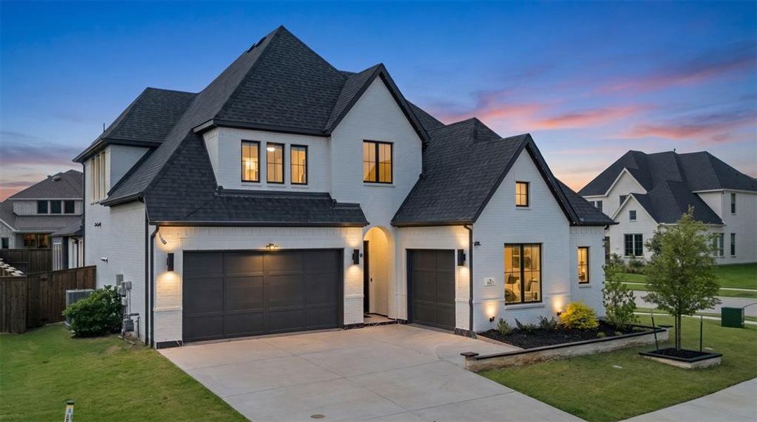 Front exterior of a new home in , Prosper, TX, highlighting curb appeal (Image 1). Front exterior of a new home in , Prosper, TX, highlighting curb appeal (Image 1).