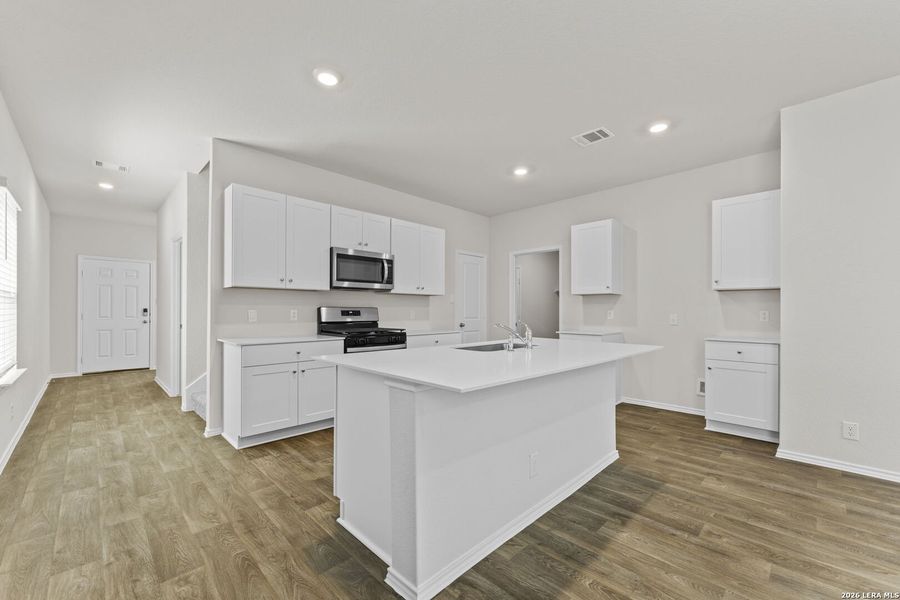 Furnished interior view inside a new home in Hunters Ranch, San Antonio (Image 4).