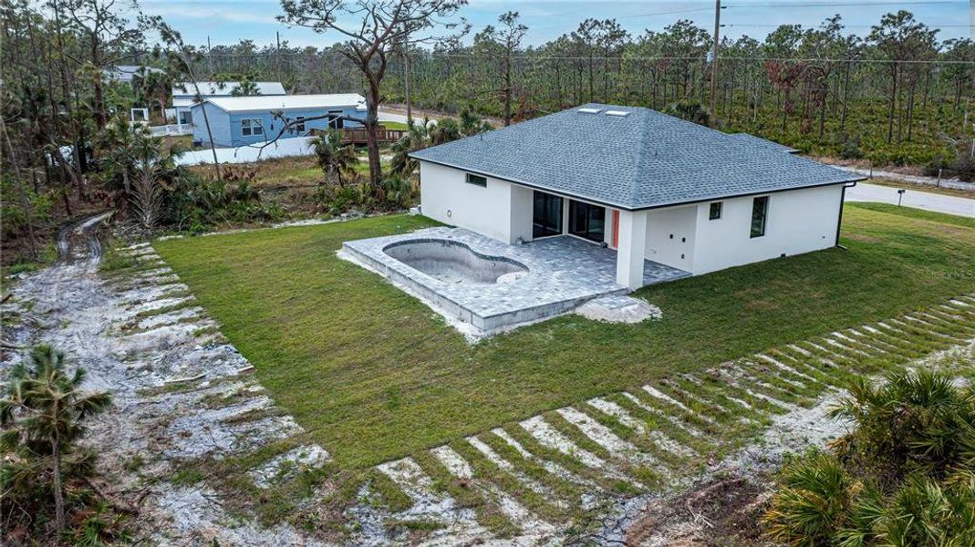 Exterior details and patio area of a home in , Port Charlotte (Image 17).