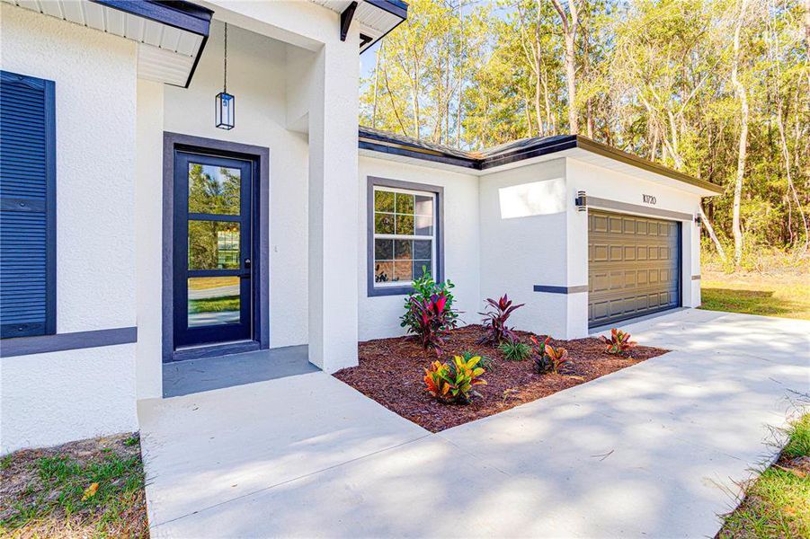 Exterior details and patio area of a home in , Citrus Springs (Image 25).