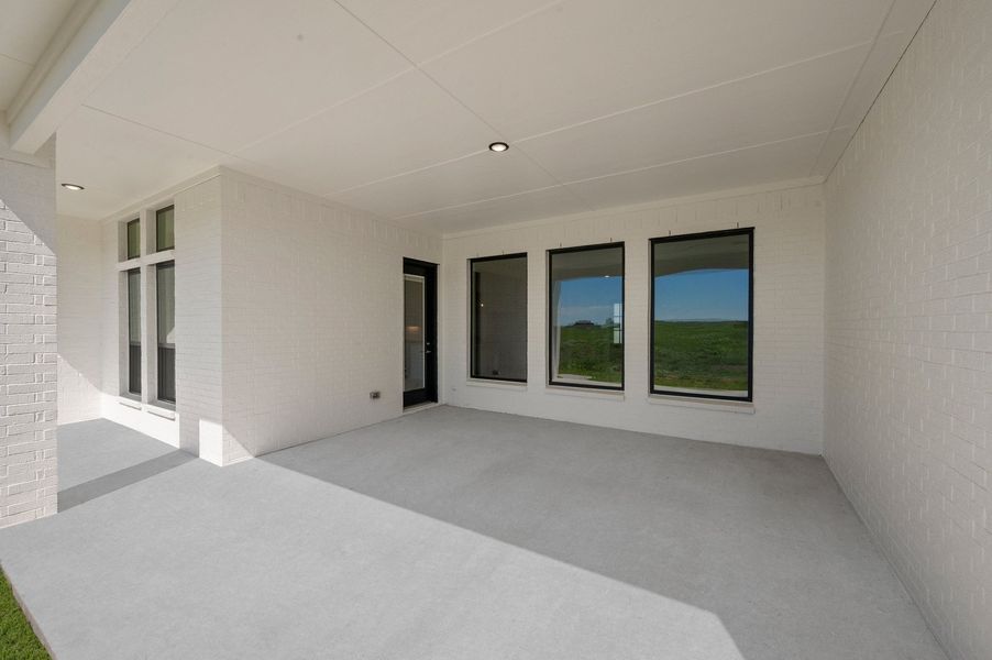Exterior details and patio area of a home in Byrum Ranch - 1 Acre Lots, Maypearl (Image 3).