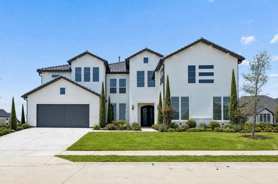 Representative exterior photo of a completed home built from the Miramonte by Grand Homes in Heath Golf & Yacht Club, Heath, TX (Image 1). Representative exterior photo of a completed home built from the Miramonte by Grand Homes in Heath Golf & Yacht Club, Heath, TX (Image 1).
