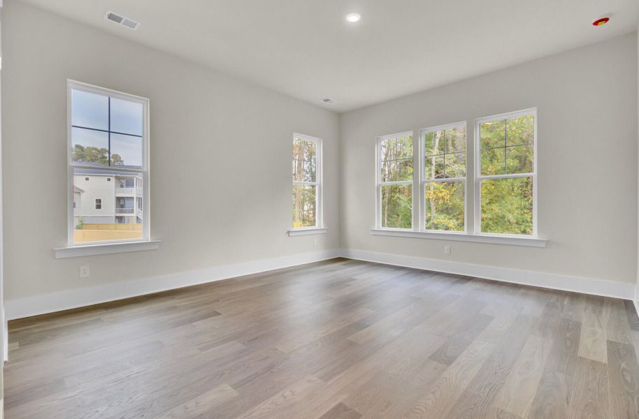 Spacious, unfurnished interior of a new home in Indigo Grove Single Family Homes, Johns Island (Image 47).